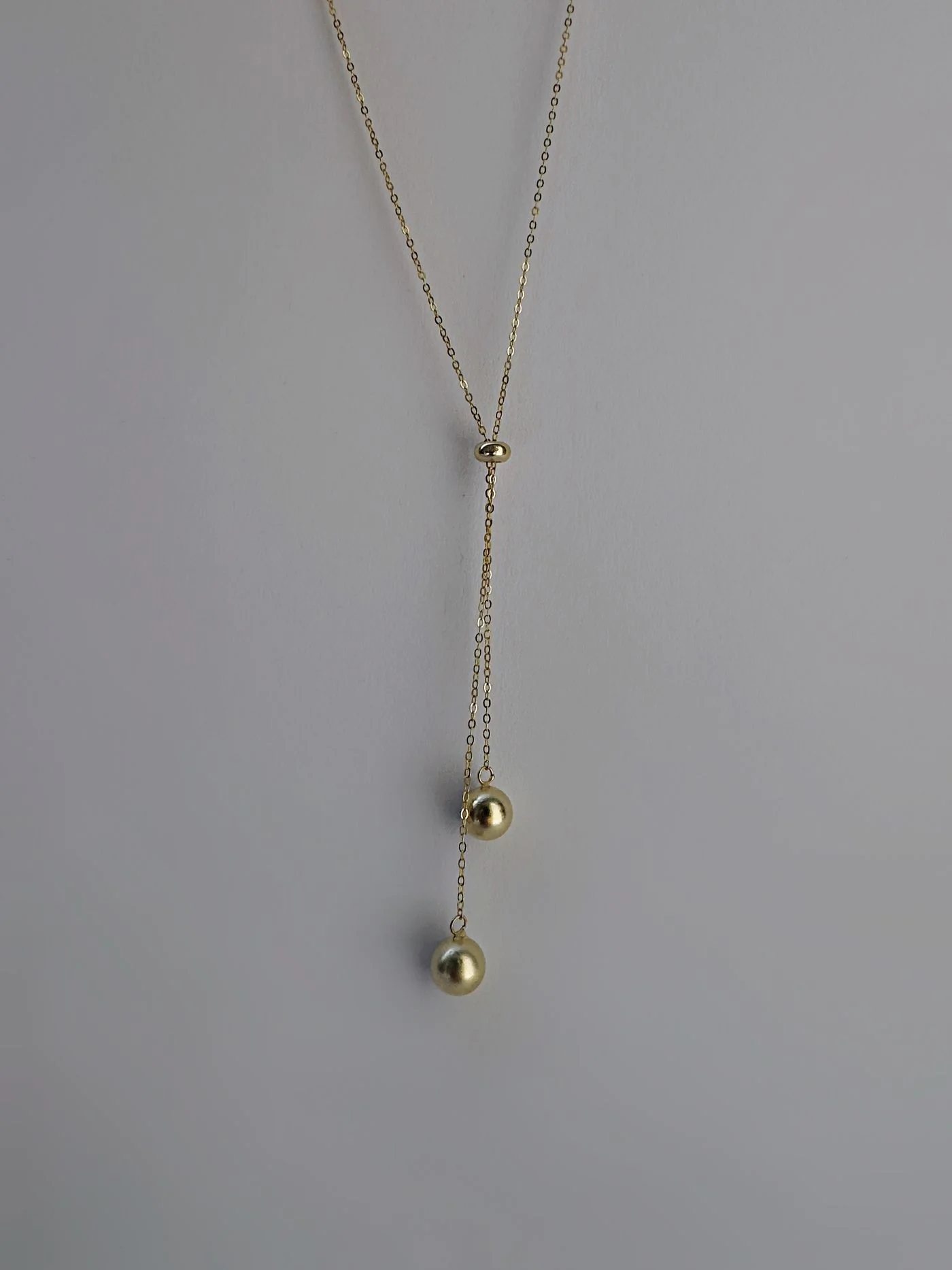 Ланцюжок-краватка на затяжках "Balls", колір золотий – обкладинка - купуйте на Chuttyevo!